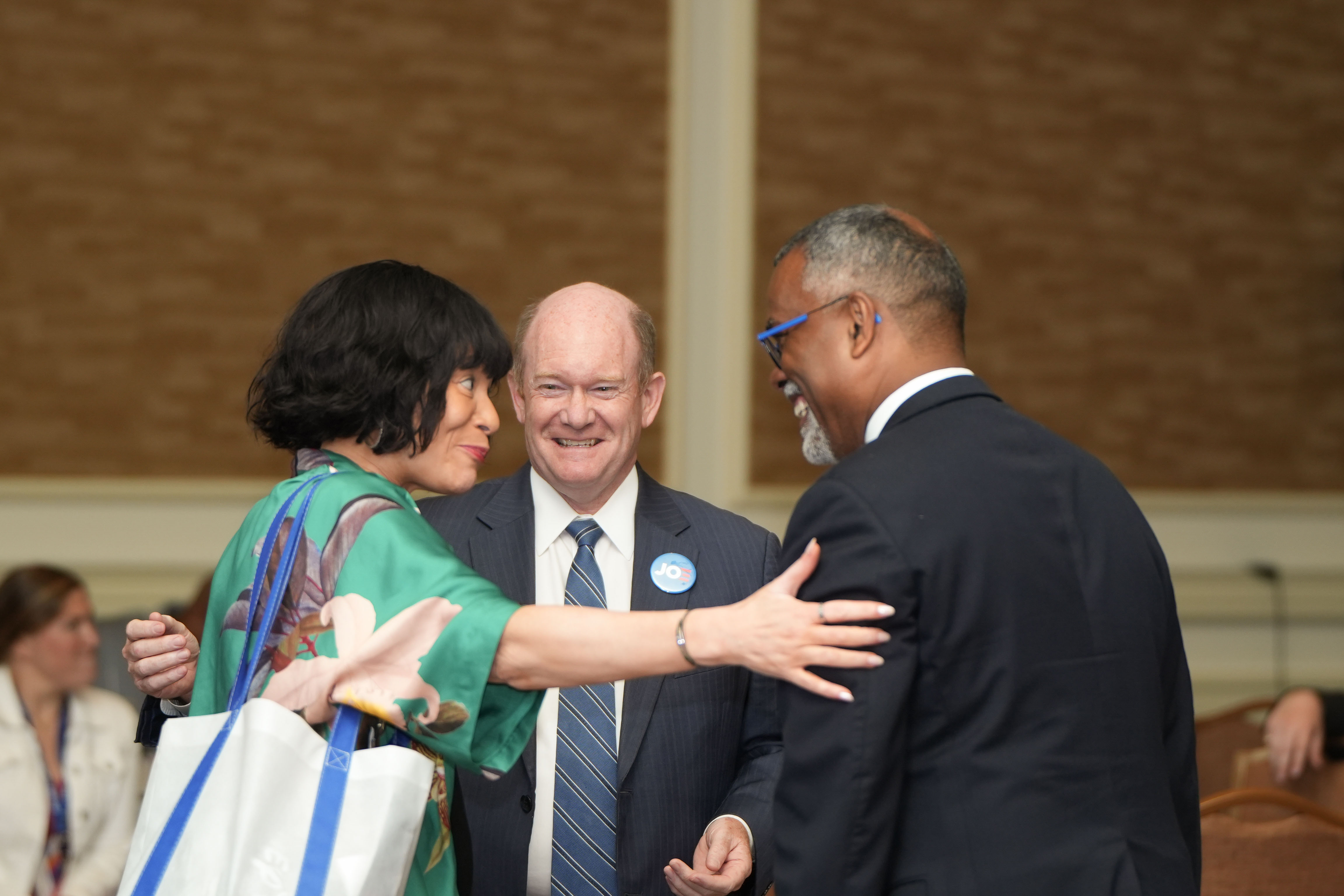 Three people in a conversation