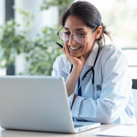 Doctor using laptop